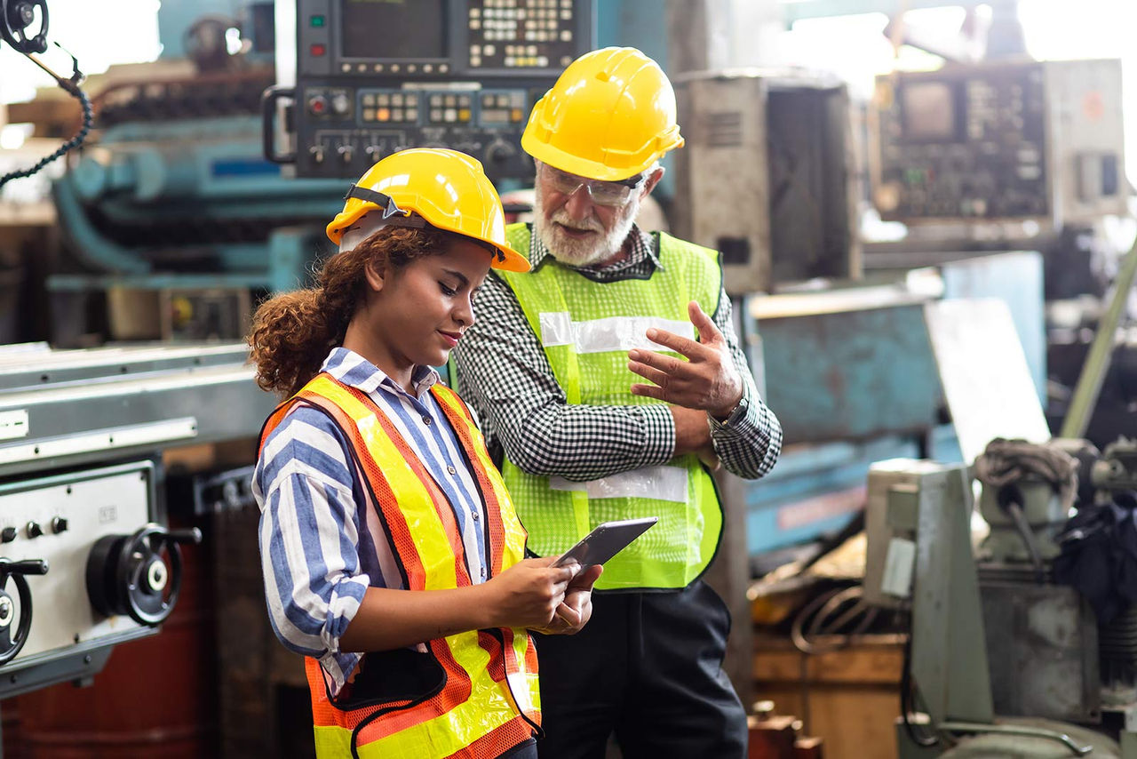Two people in factory