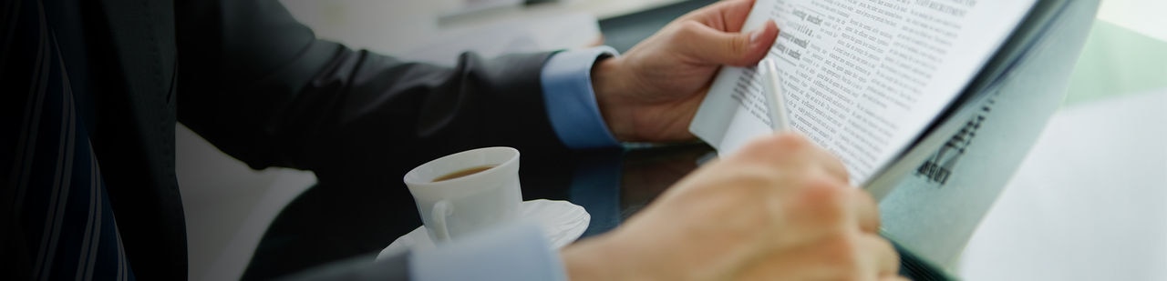 Man holding newspaper